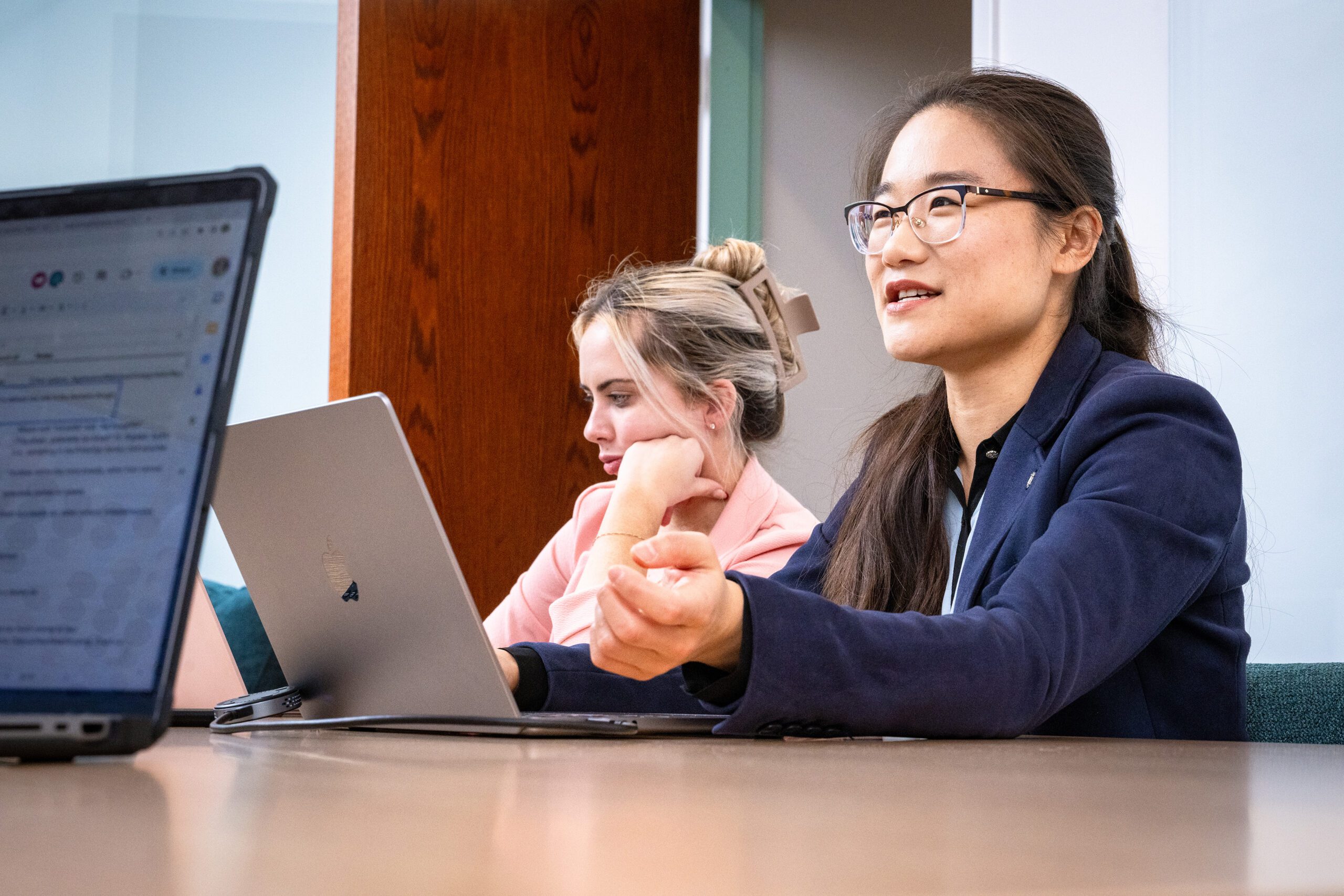 Professor teaching in small groups