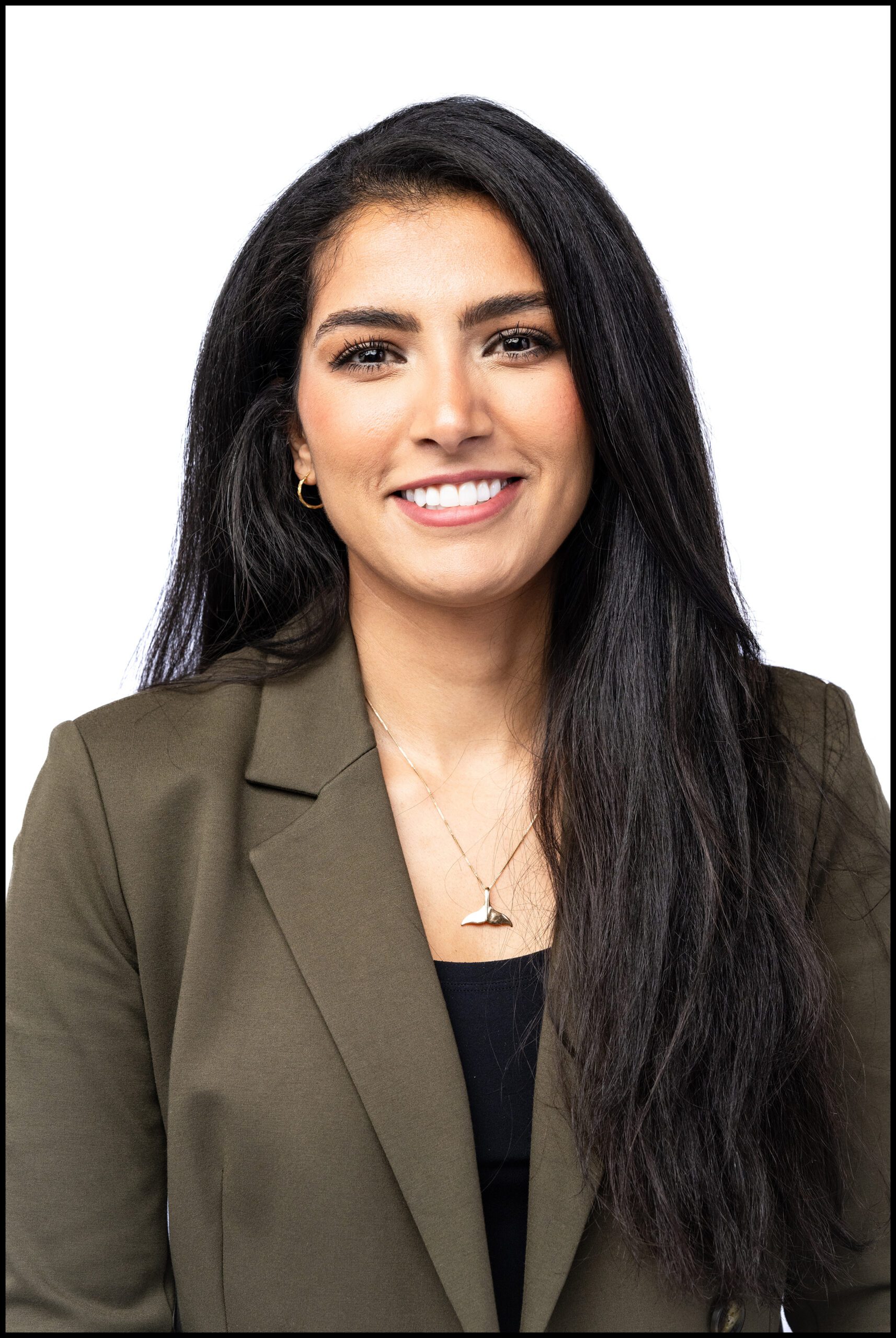 Female Headshot against white backdrop.