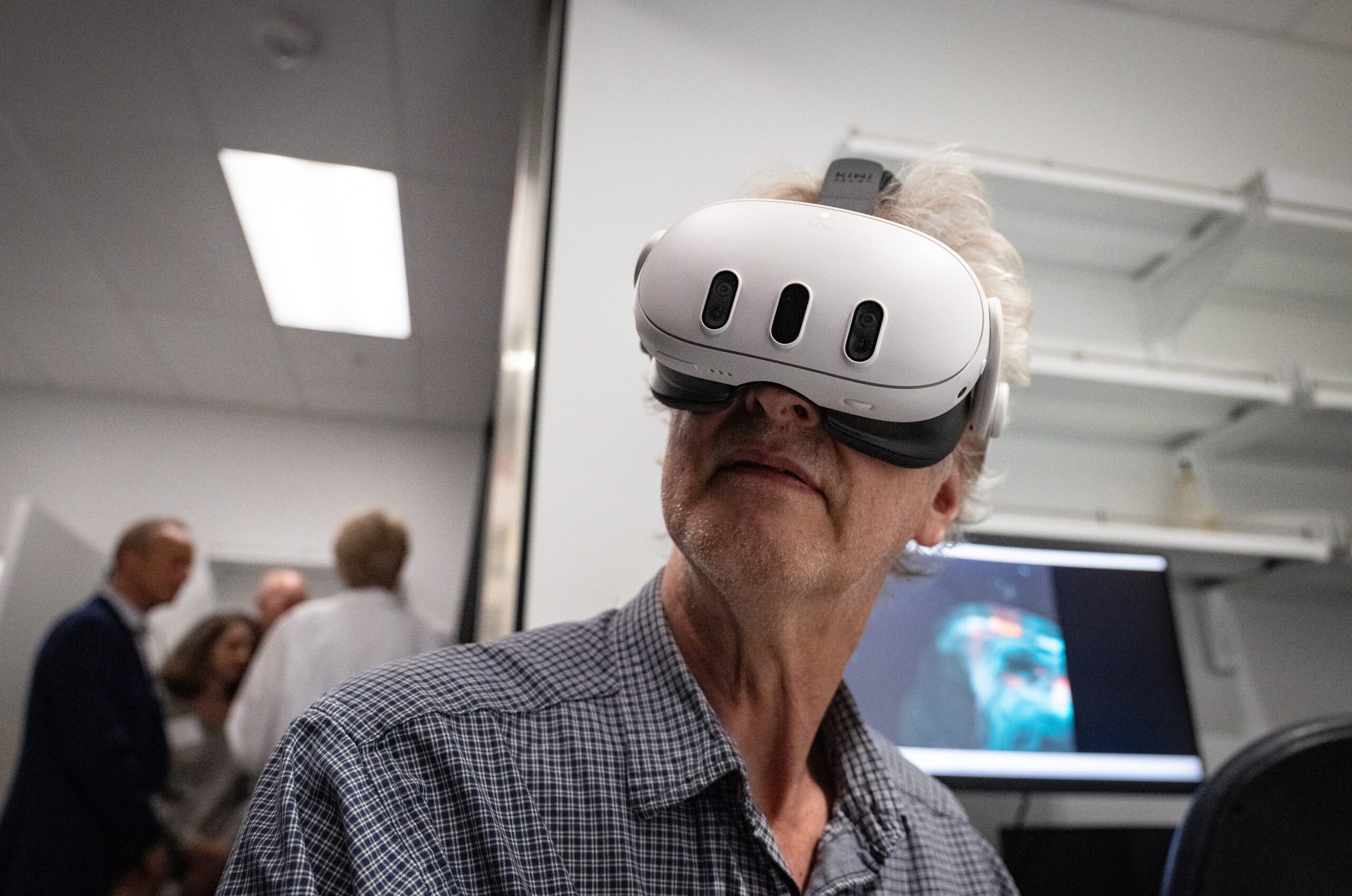 Physician Scientist explaining new neuroscience research to help victims of stroke. Imagine a world...Where the brain heals itself.